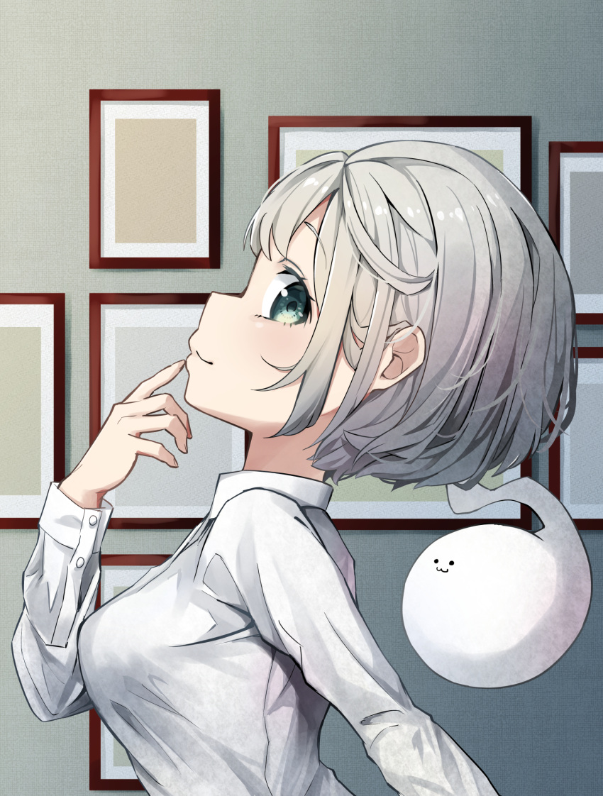 1girl alternate_costume bangs blush breasts closed_mouth commentary_request eyebrows_visible_through_hair finger_to_mouth from_side hand_up highres hitodama konpaku_youmu konpaku_youmu_(ghost) long_sleeves looking_at_viewer looking_to_the_side medium_breasts pegashi picture_frame profile shirt short_hair sideways_glance silver_hair smile solo touhou upper_body white_shirt