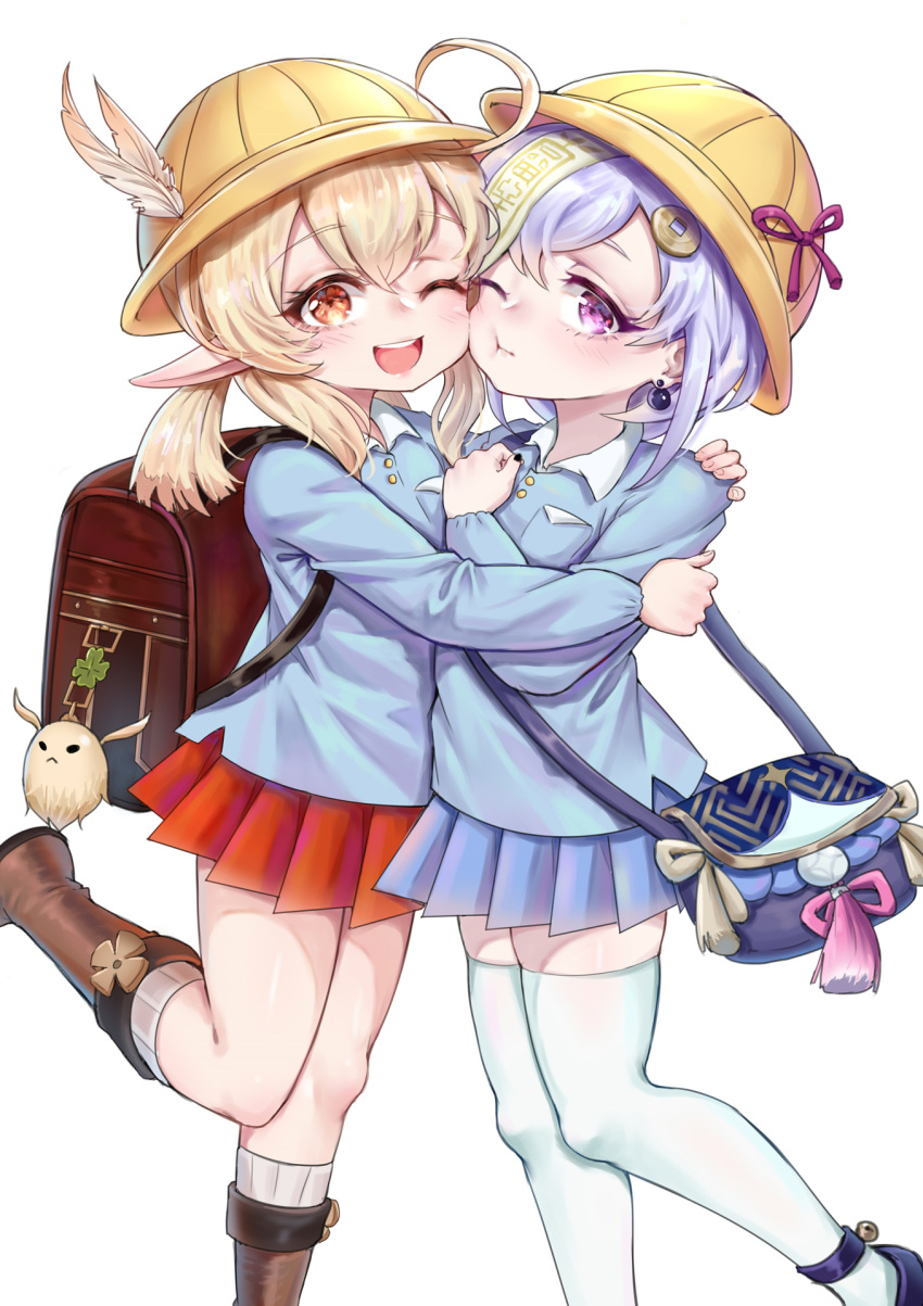 2girls ;d ;t ahoge ai_hua_hua_de_tianxian_baobao alternate_costume backpack bag bag_charm black_footwear blonde_hair blue_shirt blue_skirt blush boots brown_footwear charm_(object) closed_mouth collared_shirt feathers genshin_impact hair_ornament hat hat_feather highres hug kindergarten_uniform klee_(genshin_impact) knee_boots kneehighs long_hair low_twintails multiple_girls ofuda one_eye_closed open_mouth pleated_skirt pointy_ears purple_hair qiqi red_eyes red_skirt ribbed_legwear school_hat shirt shoes shoulder_bag sidelocks simple_background skirt smile standing standing_on_one_leg thigh-highs twintails violet_eyes white_background white_feathers white_legwear white_shirt yellow_headwear