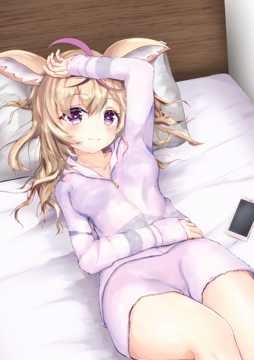 1girl absurdres ahoge animal_ears arm_on_head bed blonde_hair cellphone collarbone cowboy_shot fox_ears hand_to_head headboard highres hololive indoors long_hair looking_at_viewer lying messy_hair omaru_polka on_back on_bed pajamas phone pillow rinsu_(rins10215) smartphone smile solo thighs violet_eyes virtual_youtuber zipper