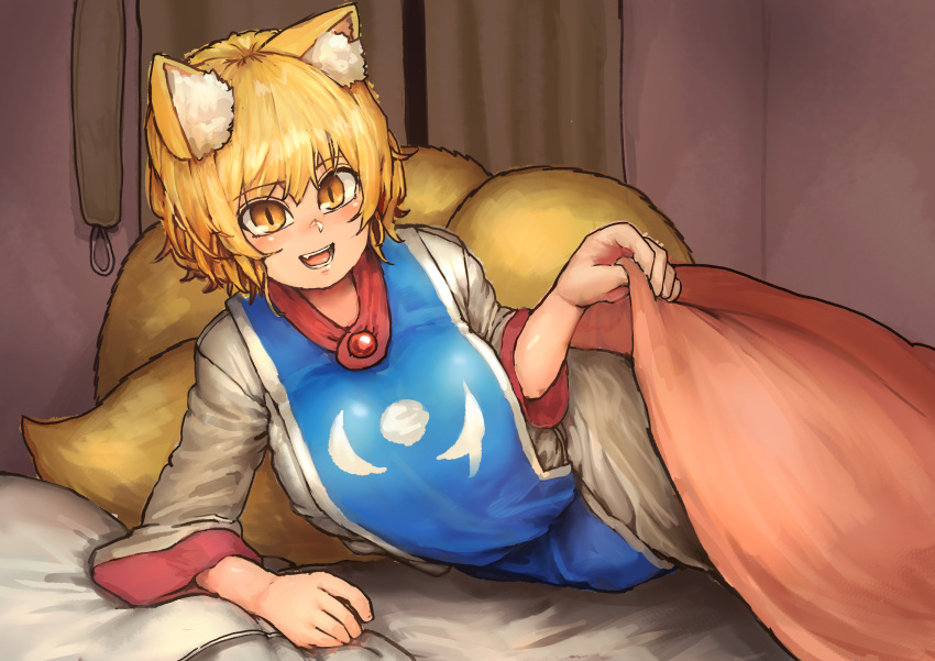 1girl :d absurdres animal_ear_fluff animal_ears arm_support blanket blonde_hair blush brooch chanta_(ayatakaoisii) fox_ears fox_tail highres huge_filesize indoors jewelry long_sleeves looking_at_viewer multiple_tails on_bed open_mouth pillow shirt short_hair slit_pupils smile solo tabard tail touhou under_covers white_shirt yakumo_ran yellow_eyes