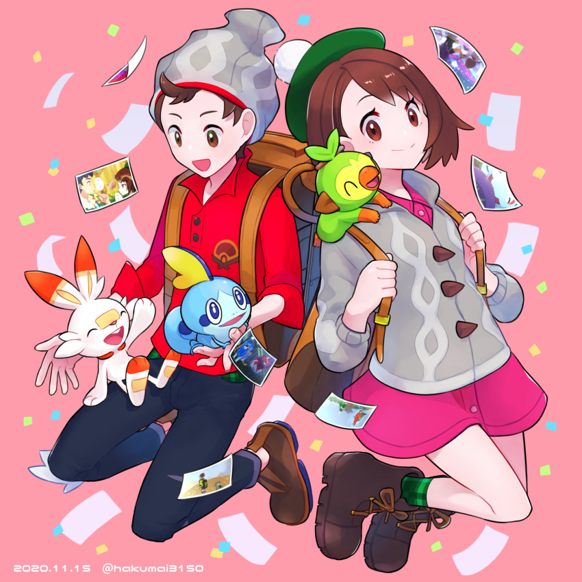 1boy 1girl aizawa_(nh_st) backpack bag bangs beanie bob_cut boots brown_bag brown_eyes brown_footwear brown_hair buttons cable_knit calyrex cardigan closed_mouth collared_dress commentary_request dated dracovish dress eyebrows_visible_through_hair gen_8_pokemon gloria_(pokemon) green_headwear green_legwear grey_cardigan grey_headwear grookey hat highres holding holding_pokemon hop_(pokemon) kubfu legendary_pokemon looking_at_viewer photo_(object) pink_dress plaid plaid_legwear pokemon pokemon_(creature) pokemon_(game) pokemon_swsh red_shirt scorbunny shirt shoes short_hair sleeves_rolled_up smile sobble socks starter_pokemon_trio suitcase swept_bangs tam_o'_shanter victor_(pokemon) watermark zacian zacian_(hero) zamazenta zamazenta_(hero)