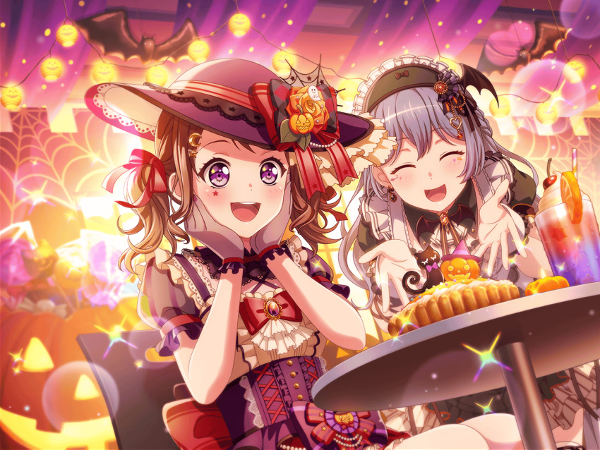 2girls asahi_rokka bang_dream! blush brown_hair decorations dress food halloween halloween_costume hand_on_own_face hat moon_(ornament) moon_hair_ornament official_art open_mouth pumpkin short_hair smile spider_web star_on_cheek toyama_kasumi violet_eyes