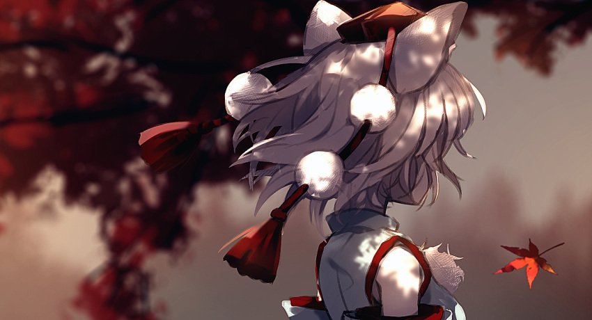 1girl animal_ears autumn_leaves blurry blurry_background commentary depth_of_field detached_sleeves dise from_behind hat inubashiri_momiji leaf maple_leaf pom_pom_(clothes) shirt short_hair solo tokin_hat touhou upper_body weapon white_hair white_shirt wolf_ears