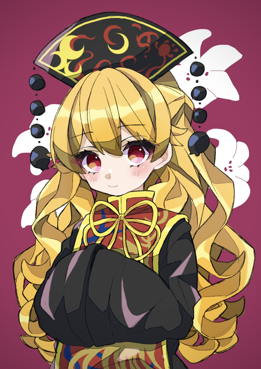1girl aji_(pokedegi) black_dress black_headwear blonde_hair blush closed_mouth commentary_request dress floral_background hands_together headdress highres junko_(touhou) long_hair looking_at_viewer pink_background red_eyes ribbon simple_background sleeves_past_wrists smile solo tabard touhou upper_body wavy_hair wide_sleeves yellow_neckwear yellow_ribbon