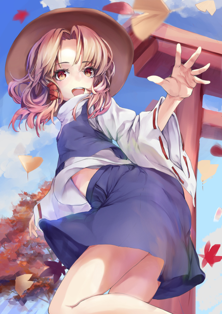 1girl arm_up asllapistone autumn autumn_leaves bangs blonde_hair blue_skirt blue_sky blue_vest brown_eyes brown_headwear clouds commentary eyebrows_visible_through_hair feet_out_of_frame folded_leg ginkgo_leaf hat high_collar highres leaf long_sleeves looking_at_viewer maple_leaf midriff_peek moriya_suwako open_mouth outdoors parted_bangs ribbon-trimmed_sleeves ribbon_trim shirt short_hair skirt sky solo standing standing_on_one_leg torii touhou tree upper_teeth vest white_shirt wide_sleeves
