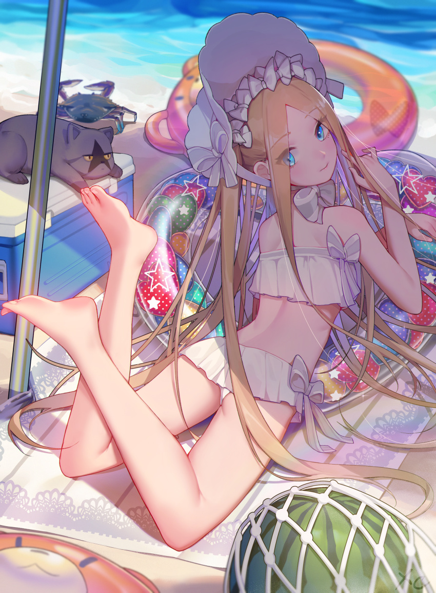 1girl abigail_williams_(fate/grand_order) abigail_williams_(swimsuit_foreigner)_(fate) absurdres ass back bangs bare_shoulders beach bikini blonde_hair blue_eyes blush bonnet bow breasts cat crab fate/grand_order fate_(series) feet feet_up food forehead fruit hair_bow highres innertube legs long_hair looking_at_viewer looking_back lying miniskirt navel on_stomach parted_bangs shore sidelocks skirt small_breasts swimsuit twintails very_long_hair watermelon white_bikini white_bow white_headwear xingchee