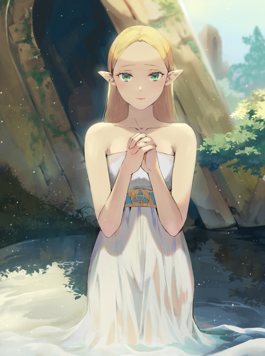 1girl absurdres bare_shoulders blonde_hair blue_sky bush commentary dress grass green_eyes hands_together highres ice_(ice_aptx) interlocked_fingers looking_at_viewer outdoors partially_submerged pink_lips pointy_ears princess_zelda see-through sky strapless strapless_dress the_legend_of_zelda water wet wet_clothes wet_dress white_dress