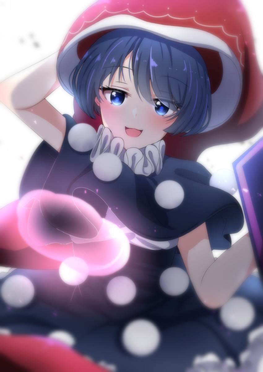 1girl :3 :d arm_behind_head blob bloom blue_dress blue_eyes blue_hair blurry blush book bright_pupils depth_of_field doremy_sweet dream_soul dress eyebrows_visible_through_hair eyes_visible_through_hair frills from_below hair_between_eyes hat highres holding holding_book looking_at_viewer nightcap open_mouth pom_pom_(clothes) poncho red_headwear short_hair simple_background smile solo touhou upper_body white_background yukome