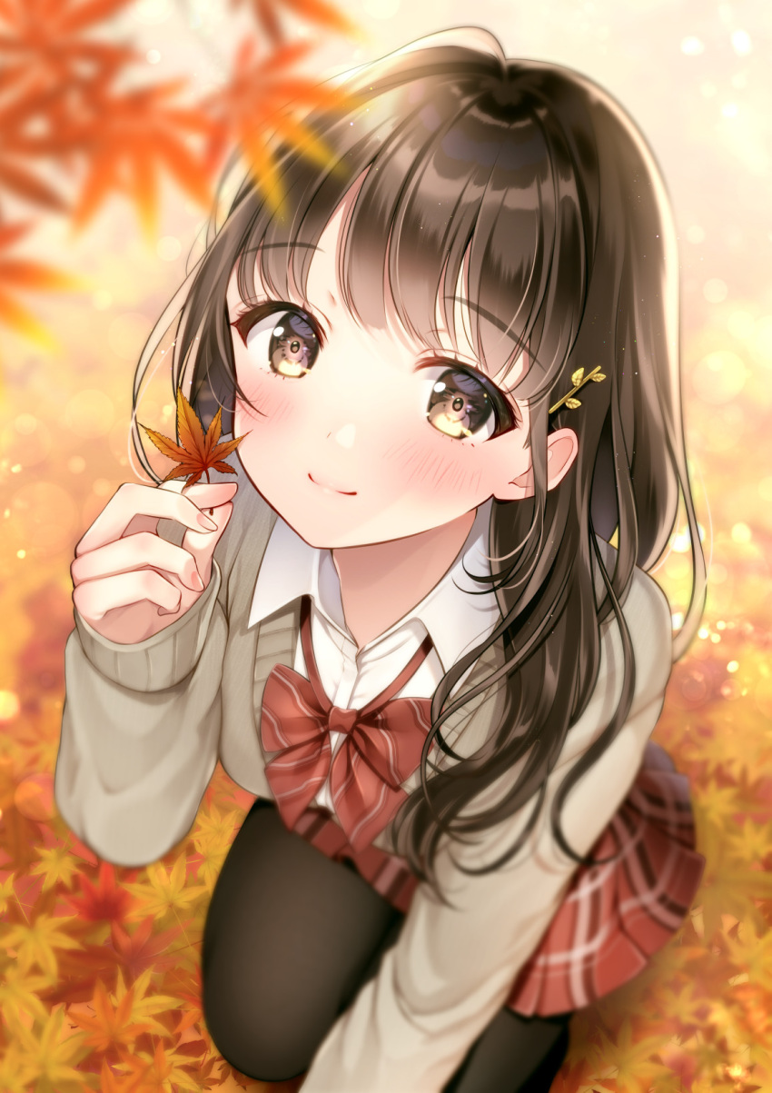 1girl ahoge arm_up autumn autumn_leaves black_legwear blush bow bowtie brown_eyes brown_hair cardigan closed_mouth commentary_request eyebrows_visible_through_hair hair_ornament hairclip highres long_hair long_sleeves looking_at_viewer looking_up original outdoors pantyhose plaid plaid_skirt pleated_skirt red_bow red_skirt school_uniform skirt smile solo squatting yugirlpict