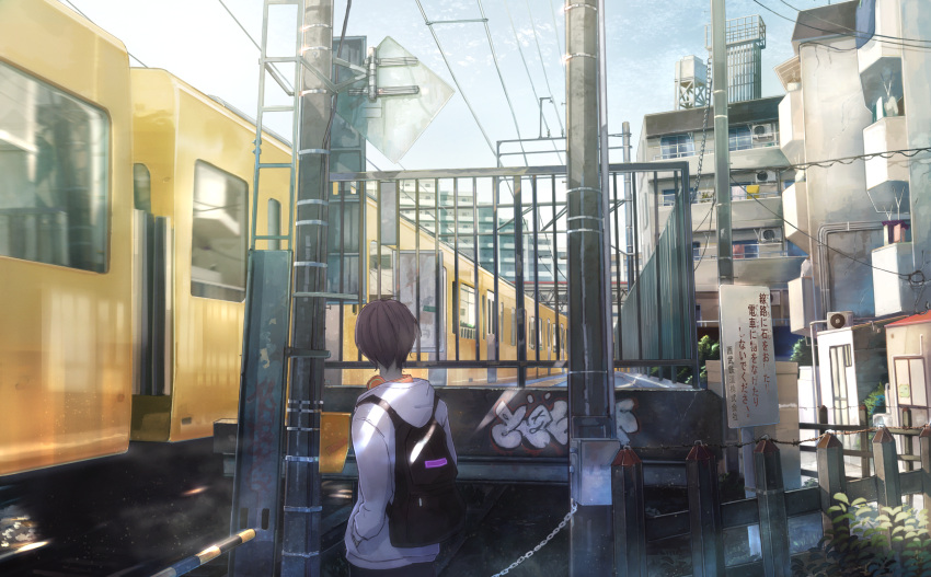 1boy backpack bag brown_hair building city fence ground_vehicle hands_in_pockets headphones headphones_around_neck highres hood hoodie looking_to_the_side original outdoors plant power_lines railroad_crossing railroad_tracks sakura_inu_(itoyatomo) scenery short_hair sign train train_station utility_pole