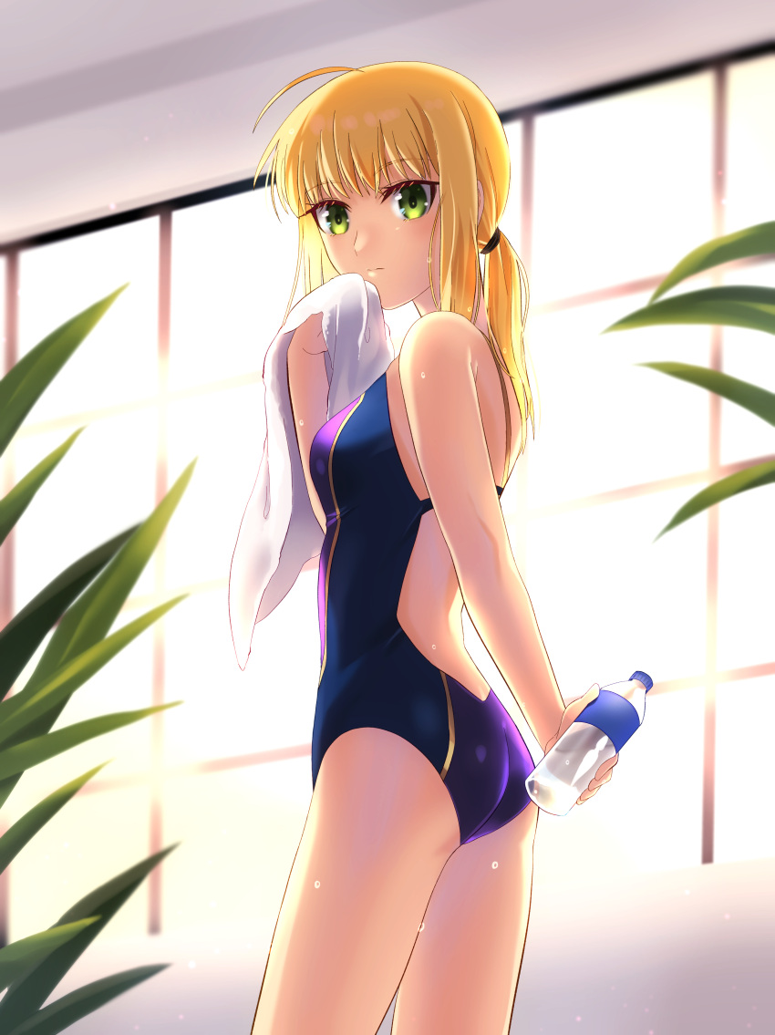 1girl absurdres ahoge artoria_pendragon_(all) ass bangs blonde_hair blue_swimsuit bottle closed_mouth competition_swimsuit cowboy_shot eyebrows_visible_through_hair fate/stay_night fate_(series) from_side green_eyes highres holding holding_bottle holding_towel kanikanidosanko long_hair one-piece_swimsuit ponytail saber solo standing swimsuit towel water_bottle white_towel