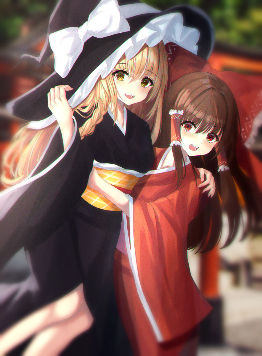 2girls absurdres alternate_costume alternate_hairstyle arm_around_back arm_up black_headwear black_kimono blonde_hair blurry blurry_background blurry_foreground braid brown_hair commentary_request day dutch_angle eyebrows_visible_through_hair feet_out_of_frame hair_between_eyes hair_ribbon hair_tubes hakurei_reimu hand_on_another's_shoulder hand_on_another's_waist hand_on_headwear hat hat_ribbon highres japanese_clothes kimono kirisame_marisa kure:kuroha leaning_back long_hair long_sleeves looking_at_viewer multiple_girls obi open_mouth outdoors partial_commentary red_eyes red_kimono ribbon sash sidelocks single_braid torii touhou upper_teeth very_long_hair wide_sleeves witch_hat yellow_eyes