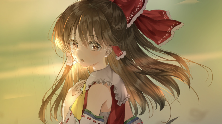 1girl :o ascot bangs blurry blurry_background bow brown_eyes brown_hair close-up detached_sleeves eyebrows_visible_through_hair floating_hair frilled_shirt_collar frills from_side hair_bow hair_over_eyes hair_ribbon hair_tubes hakurei_reimu half_updo hand_on_own_chest hand_up light_blush long_fingers looking_at_viewer looking_back looking_to_the_side medium_hair parted_lips piyo_(sqn2idm751) portrait raised_eyebrows red_bow red_ribbon red_shirt ribbon ribbon-trimmed_sleeves ribbon_trim sarashi shirt sleeveless sleeveless_shirt solo sunset tareme touhou yellow_neckwear