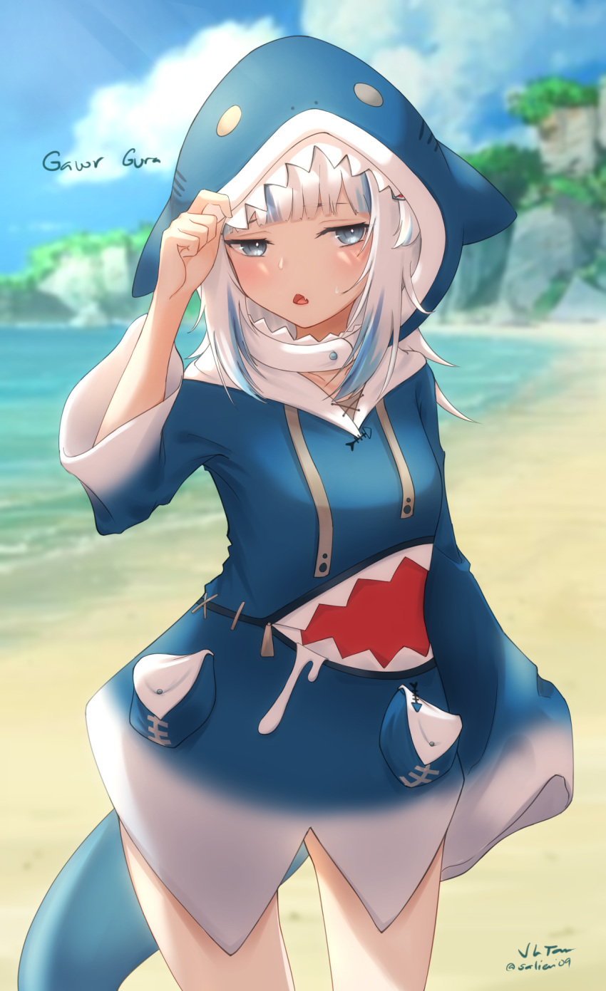 1girl bangs beach blue_eyes blue_hoodie blunt_bangs blurry blurry_background blush breasts character_name clouds cloudy_sky contrapposto cowboy_shot day eyebrows_behind_hair fish_bone gawr_gura gradient_clothes half-closed_eyes hand_on_headwear hand_up highres hololive hololive_english hood hood_up hoodie jl_tan long_hair looking_to_the_side multicolored_hair open_mouth outdoors plateau signature silver_hair sky sleeves_past_fingers sleeves_past_wrists small_breasts solo standing streaked_hair triangle_mouth virtual_youtuber water wide_sleeves