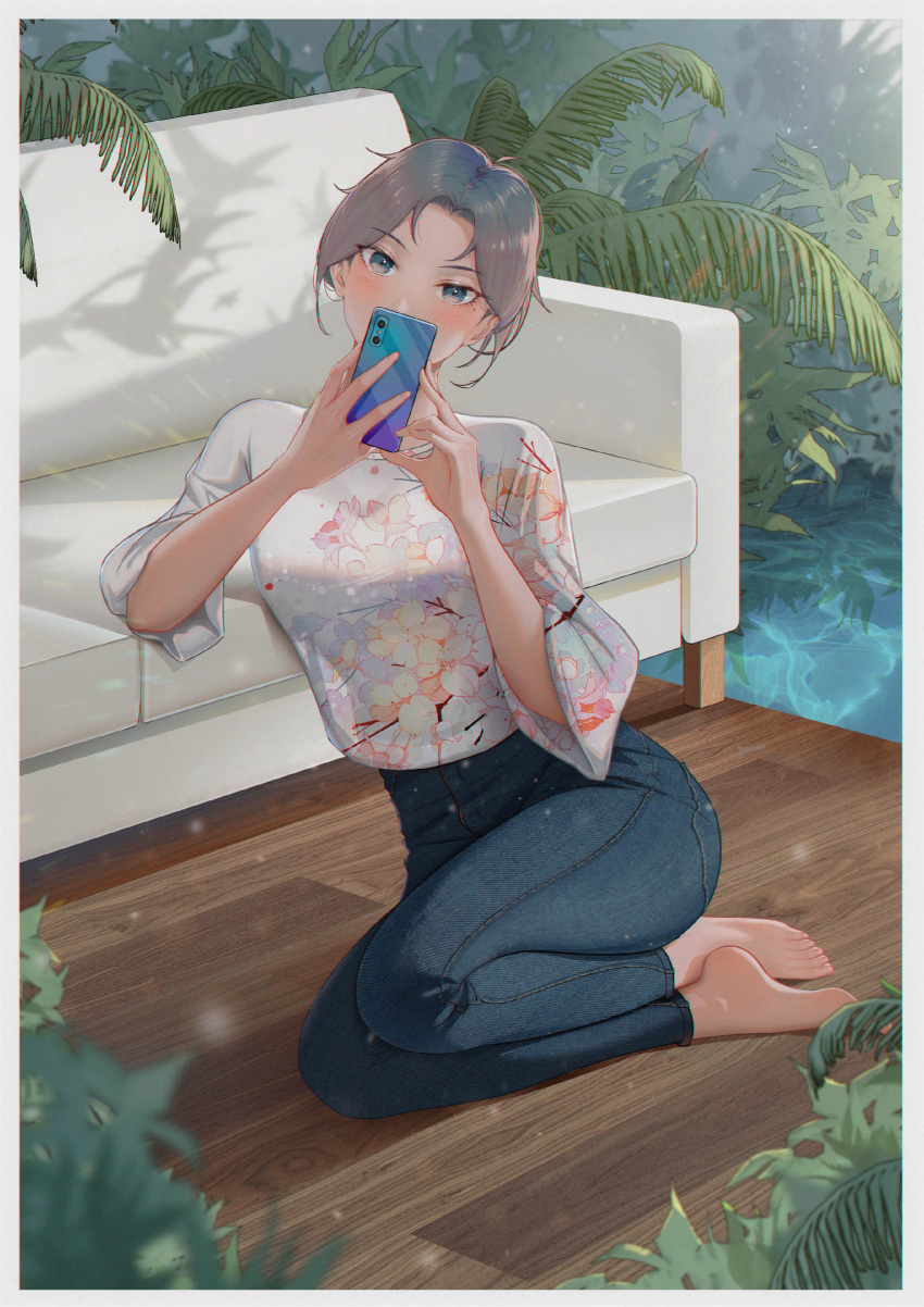 1girl absurdres barefoot blue_eyes blush brown_hair cellphone couch covering_face denim floral_print garden highres jeans leaning_on_object looking_at_viewer mole mole_under_eye original pants phone plant qizhu shirt short_hair sitting smartphone tied_hair toes water wide_sleeves wooden_floor