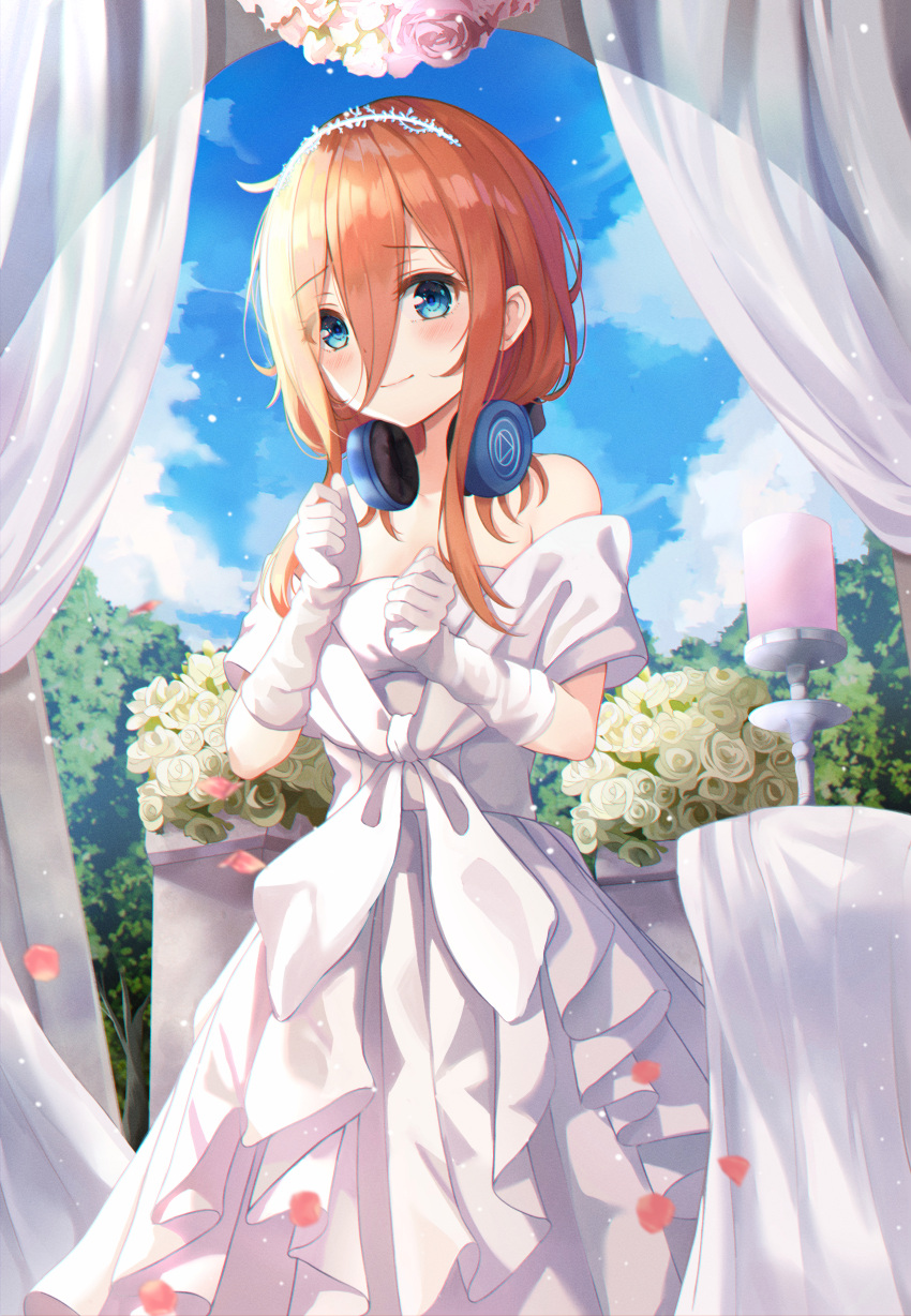 1girl absurdres bangs bare_shoulders blue_eyes blue_sky blush bride candle closed_mouth clouds day dress elbow_gloves eyebrows_visible_through_hair feet_out_of_frame flower gloves go-toubun_no_hanayome hair_between_eyes headphones highres huge_filesize layered_dress long_hair looking_at_viewer ms_childofart nakano_miku off-shoulder_dress off_shoulder orange_hair outdoors petals rose sky smile solo standing tiara wedding_dress white_dress white_flower white_gloves white_rose