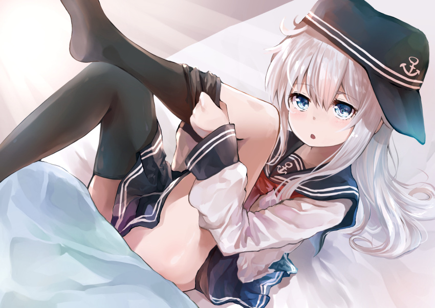 1girl anchor_symbol bed black_headwear black_legwear black_sailor_collar black_skirt commentary_request dressing flat_cap hat hibiki_(kantai_collection) highres kantai_collection looking_at_viewer lying neckerchief pleated_skirt red_neckwear sailor_collar school_uniform serafuku skirt solo taisho_(gumiyuki)