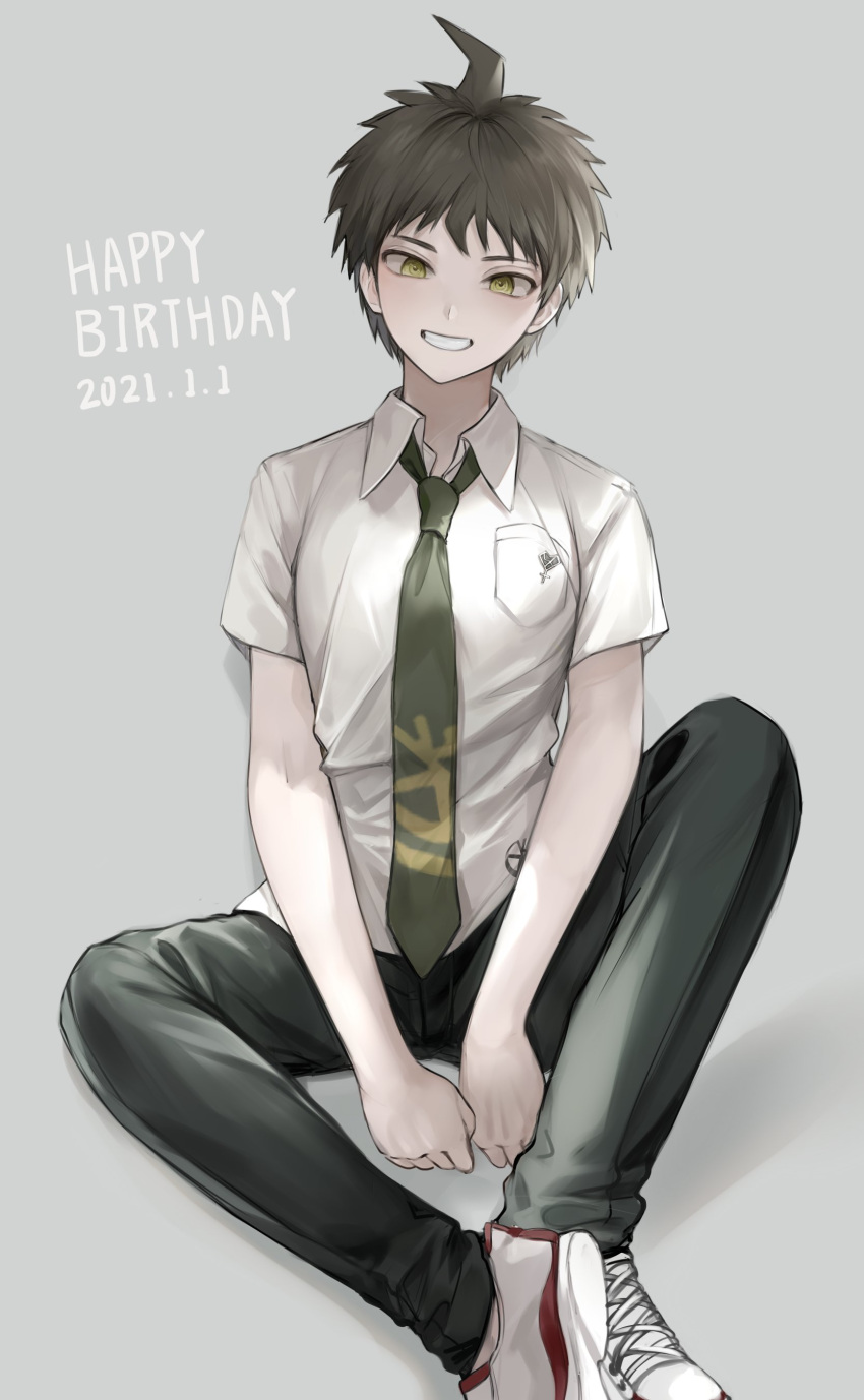 1boy absurdres ahoge bangs black_pants breast_pocket brown_eyes brown_hair collared_shirt commentary_request dangan_ronpa_(series) dangan_ronpa_2:_goodbye_despair dated full_body green_neckwear grey_background grin happy_birthday highres hinata_hajime looking_at_viewer loose_necktie male_focus muuyiie necktie pants pocket red_footwear shirt shoes short_hair short_sleeves simple_background sitting smile sneakers solo v_arms white_footwear white_shirt