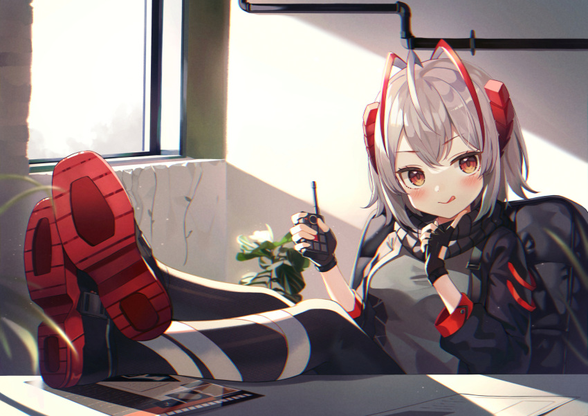 1girl antenna_hair arknights bandaged_leg bandages bangs black_jacket black_legwear black_scarf blush breasts chair controller desk eyebrows_visible_through_hair flyer grey_hair grey_sweater highres horns jacket licking_lips looking_at_viewer medium_breasts nam orange_eyes plant red_horns redhead remote_control scarf shoes short_hair sleeveless_sweater solo sunlight sweater tongue tongue_out w_(arknights)