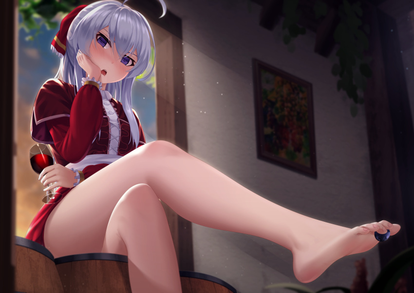 1girl :o ahoge alcohol barefoot blurry blurry_background blush crossed_legs cup dress drinking_glass elaina_(majo_no_tabitabi) hand_on_own_cheek hand_on_own_face highres indoors legs long_hair majo_no_tabitabi red_dress silver_hair sitting soles solo toe_scrunch toes too-ye violet_eyes wine wine_glass