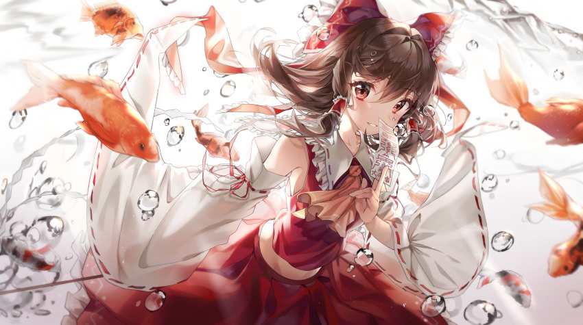 1girl absurdres ascot bangs bow brown_hair collarbone detached_sleeves eyebrows_visible_through_hair fish floating_hair goldfish hair_bow hakurei_reimu highres holding huge_filesize japanese_clothes long_hair looking_at_viewer miko nagul navel open_mouth parted_bangs red_bow red_eyes red_neckwear red_skirt sidelocks skirt solo touhou water wide_sleeves