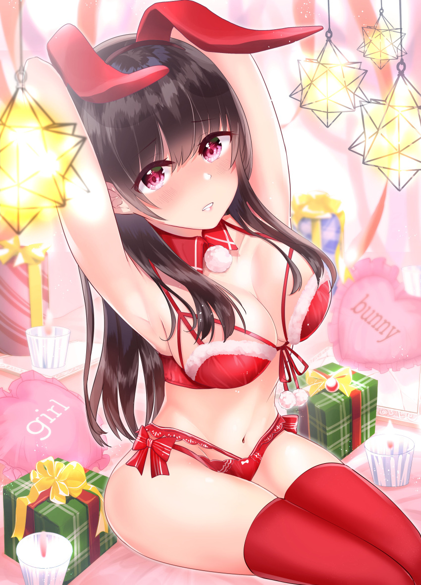 1girl absurdres amaimomo animal_ears armpits arms_up black_hair bra breasts candle christmas embarrassed gift heart heart_pillow highres large_breasts long_hair looking_at_viewer navel original panties pillow rabbit_ears red_bra red_eyes red_legwear red_panties solo thigh-highs underwear