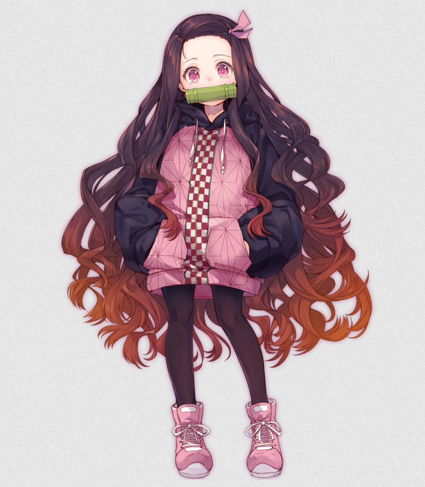 1girl adapted_costume bamboo bit_gag black_hair black_legwear contemporary forehead full_body gag gorillabbit gradient_hair hair_ribbon hands_in_pockets highres hood hoodie kamado_nezuko kimetsu_no_yaiba long_hair long_sleeves looking_at_viewer mouth_hold multicolored_hair pink_eyes ribbon shoes simple_background sneakers solo very_long_hair