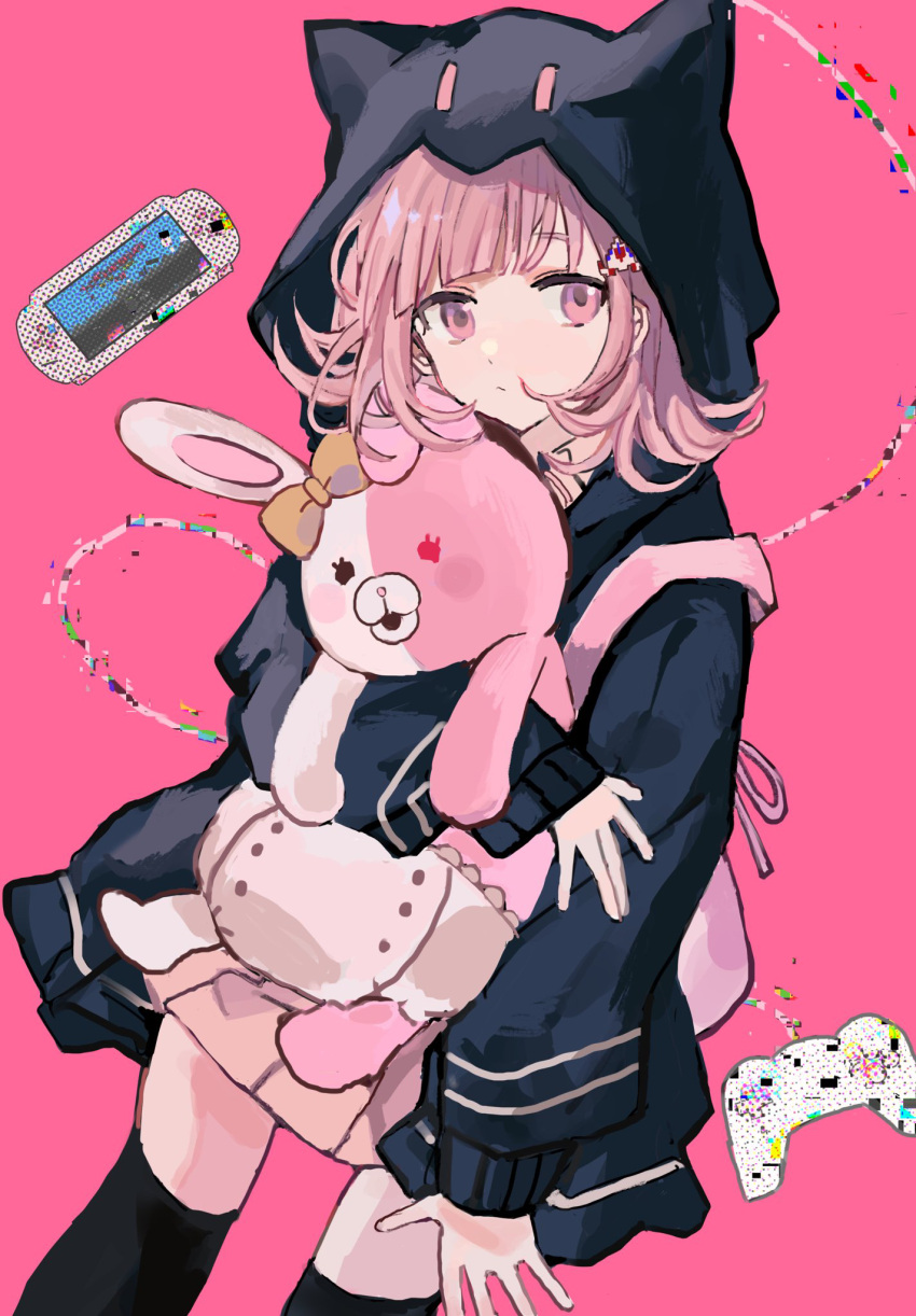 1girl animal_ears arm_at_side backpack bag bangs beige_skirt black_jacket black_legwear brown_skirt cat_bag closed_mouth commentary_request controller cowboy_shot dangan_ronpa_(series) dangan_ronpa_2:_goodbye_despair diaper dutch_angle ear_ribbon fake_animal_ears flipped_hair game_controller hair_ornament hairclip hand_up handheld_game_console highres holding hood hood_up hooded_jacket jacket long_sleeves looking_at_viewer medium_hair monomi_(dangan_ronpa) namiharuru nanami_chiaki open_clothes open_jacket pink_background pink_bag pink_eyes pink_hair pleated_skirt simple_background skirt spaceship_hair_ornament thigh-highs zettai_ryouiki