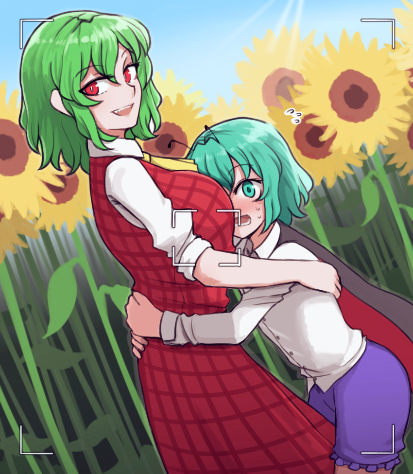 2girls antennae ascot black_cape blue_shorts blush breasts camera camera_lens cape collared_shirt embarrassed eyebrows_visible_through_hair flower green_eyes green_hair hair_between_eyes highres hug insect_girl kazami_yuuka long_sleeves looking_at_viewer mata_(matasoup) medium_hair multiple_girls open_clothes open_mouth open_vest plaid plaid_skirt plaid_vest red_cape red_eyes red_skirt red_vest shirt short_hair shorts size_difference skirt skirt_set sleeves_rolled_up slit_pupils smile standing sunflower sunlight sweatdrop touhou two-tone_cape vest white_shirt wriggle_nightbug yellow_neckwear