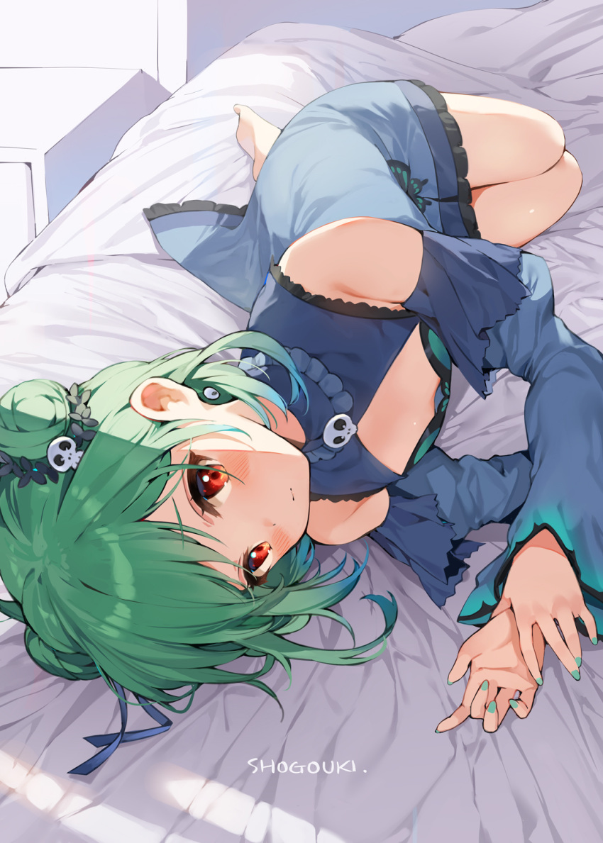 1girl bangs bare_shoulders barefoot blue_dress blue_sleeves blush closed_mouth commentary_request detached_sleeves double_bun dress earrings eyebrows_visible_through_hair frilled_dress frills green_hair hair_ornament hana_mori hands_up highres hololive jewelry juliet_sleeves long_sleeves looking_at_viewer lying on_bed on_side puffy_sleeves red_eyes skull_hair_ornament sleeveless sleeveless_dress solo uruha_rushia virtual_youtuber