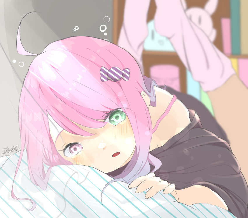 1girl ahoge black_shirt blush candy_hair_ornament ebichoco_pasta food_themed_hair_ornament green_eyes hair_ornament heterochromia highres himemori_luna hololive long_hair looking_at_viewer loose_clothes loose_shirt loose_socks lying off_shoulder on_bed on_stomach pink_eyes shirt solo violet_eyes virtual_youtuber waking_up