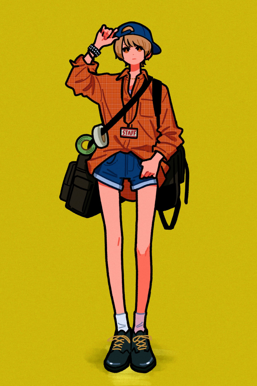 1girl absurdres arm_up bag baseball_cap black_bag black_footwear blue_headwear blue_shorts bracelet brown_eyes brown_hair brown_shirt collared_shirt flat_color hat highres jewelry original plaid plaid_shirt shadow shirt shoes short_hair shorts shoulder_bag simple_background socks solo white_legwear yellow_background yoshi_mi_yoshi