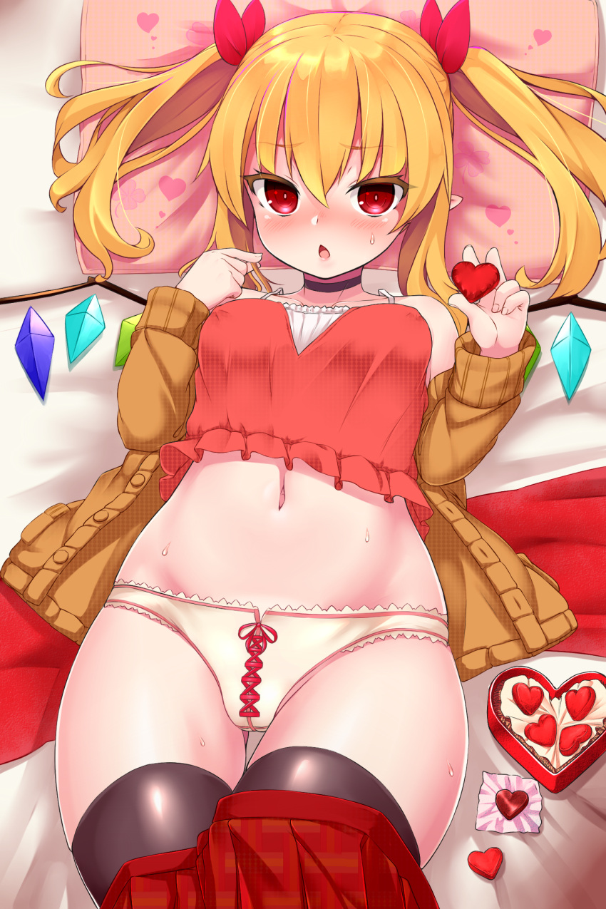 1girl black_legwear blonde_hair blush box breasts candy chocolate chocolate_heart crop_top flandre_scarlet food gift gift_box hair_ribbon heart highres long_hair looking_at_viewer lying medium_breasts navel on_back on_bed panties pillow pointy_ears red_eyes red_ribbon red_skirt ribbon shiron_(e1na1e2lu2ne3ru3) skirt skirt_pull solo sweat thigh-highs touhou twintails underwear valentine white_panties wings