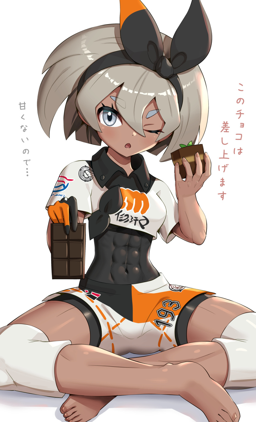 1girl bangs barefoot bea_(pokemon) black_bodysuit black_hairband blush bodysuit bodysuit_under_clothes bow_hairband candy chocolate chocolate_bar collared_shirt commentary covered_abs covered_navel dark_skin dark-skinned_female food gloves gonzarez grey_eyes grey_hair gym_leader hair_between_eyes hairband highres holding holding_chocolate holding_food knee_pads looking_at_viewer number one_eye_closed open_mouth pokemon pokemon_(game) pokemon_swsh print_shirt print_shorts shiny shiny_hair shirt short_hair short_sleeves shorts single_glove sitting solo tied_shirt toes tongue translation_request