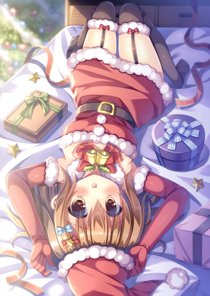 1girl :d absurdres arms_up bangs bed bell belt belt_buckle black_belt black_legwear blurry blurry_background blush bow box breasts brown_eyes brown_hair buckle christmas christmas_ornaments christmas_tree commentary_request depth_of_field dress elbow_gloves eyebrows_visible_through_hair fur-trimmed_gloves fur-trimmed_headwear fur-trimmed_legwear fur_trim garter_straps gift gift_box gloves hair_between_eyes hat highres kouta. long_hair looking_at_viewer medium_breasts no_shoes on_bed open_mouth original red_bow red_dress red_gloves red_headwear santa_costume santa_hat smile solo star_(symbol) strapless strapless_dress thigh-highs
