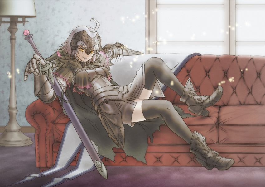 1girl ahoge armor armored_boots armored_dress bangs black_legwear boots breasts cape chain couch eyebrows_visible_through_hair fang fate/grand_order fate_(series) floor_lamp full_body fur-trimmed_cape fur_trim gauntlets grin headpiece highres indoors jeanne_d'arc_(alter)_(fate) jeanne_d'arc_(fate)_(all) leaning_back poponta_(hi-key) sheath sheathed short_hair silver_hair sitting smile solo sword thigh-highs weapon yellow_eyes