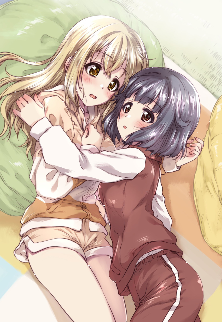 2girls bang_dream! bangs bean_bag_chair black_hair blonde_hair blush brown_eyes casual commentary_request eyebrows_visible_through_hair frown highres hood hoodie ichigaya_arisa indoors jacket kuroi_mimei long_hair long_sleeves looking_at_another lying multiple_girls on_back on_person on_stomach open_mouth orange_jacket pants red_eyes red_jacket red_pants short_hair shorts sweatdrop track_jacket track_pants ushigome_rimi yellow_shorts yuri