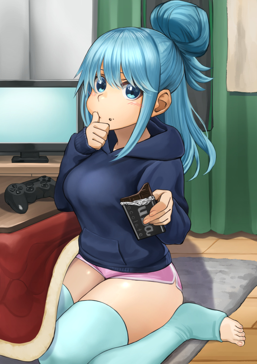 1girl alternate_costume aqua_(konosuba) blue_eyes blue_hair blue_hoodie blue_legwear blush breasts candy chocolate chocolate_bar commentary_request controller curtains eating finger_to_cheek food game_controller hair_bun highres hood hood_down hoodie indoors izawa_koushi kono_subarashii_sekai_ni_shukufuku_wo! large_breasts long_hair long_sleeves looking_at_viewer panties pink_shorts playstation_controller shiny shiny_hair shorts sitting solo television thigh-highs toeless_legwear underwear wariza