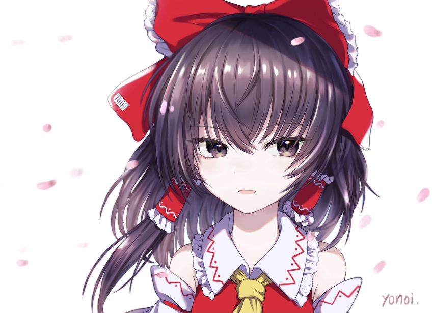 1girl artist_name ascot bangs bare_shoulders bow brown_eyes brown_hair commentary_request detached_sleeves expressionless eyebrows_visible_through_hair face falling_petals frilled_shirt_collar frills hair_between_eyes hair_bow hair_tubes hakurei_reimu highres long_hair looking_at_viewer parted_lips petals red_bow red_vest sidelocks simple_background solo touhou upper_body vest white_background yellow_neckwear yonoisan