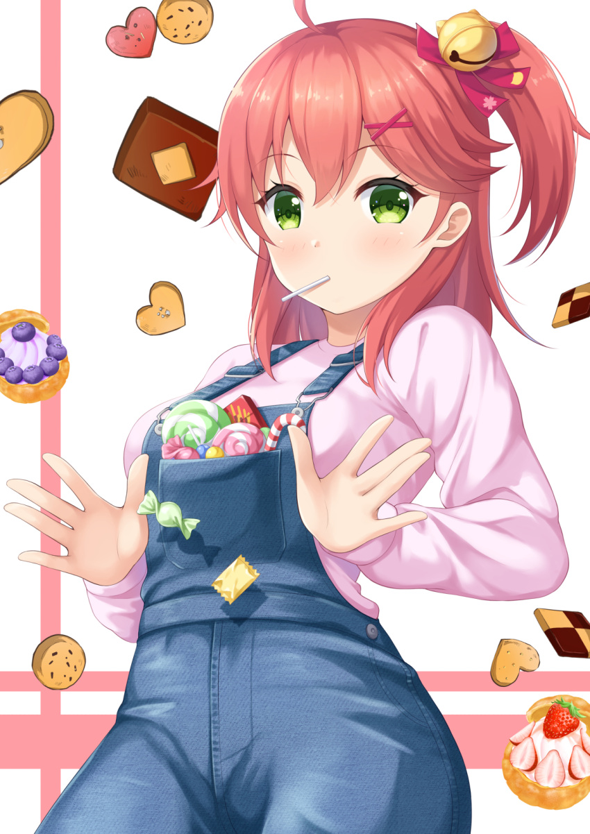 1girl 7fuji_06 bell candy candy_cane cookie denim food food_in_mouth food_request green_eyes hair_bell hair_between_eyes hair_ornament highres hololive lollipop long_sleeves looking_at_viewer medium_hair overalls pink_hair pink_shirt sakura_miko shirt side_ponytail solo virtual_youtuber