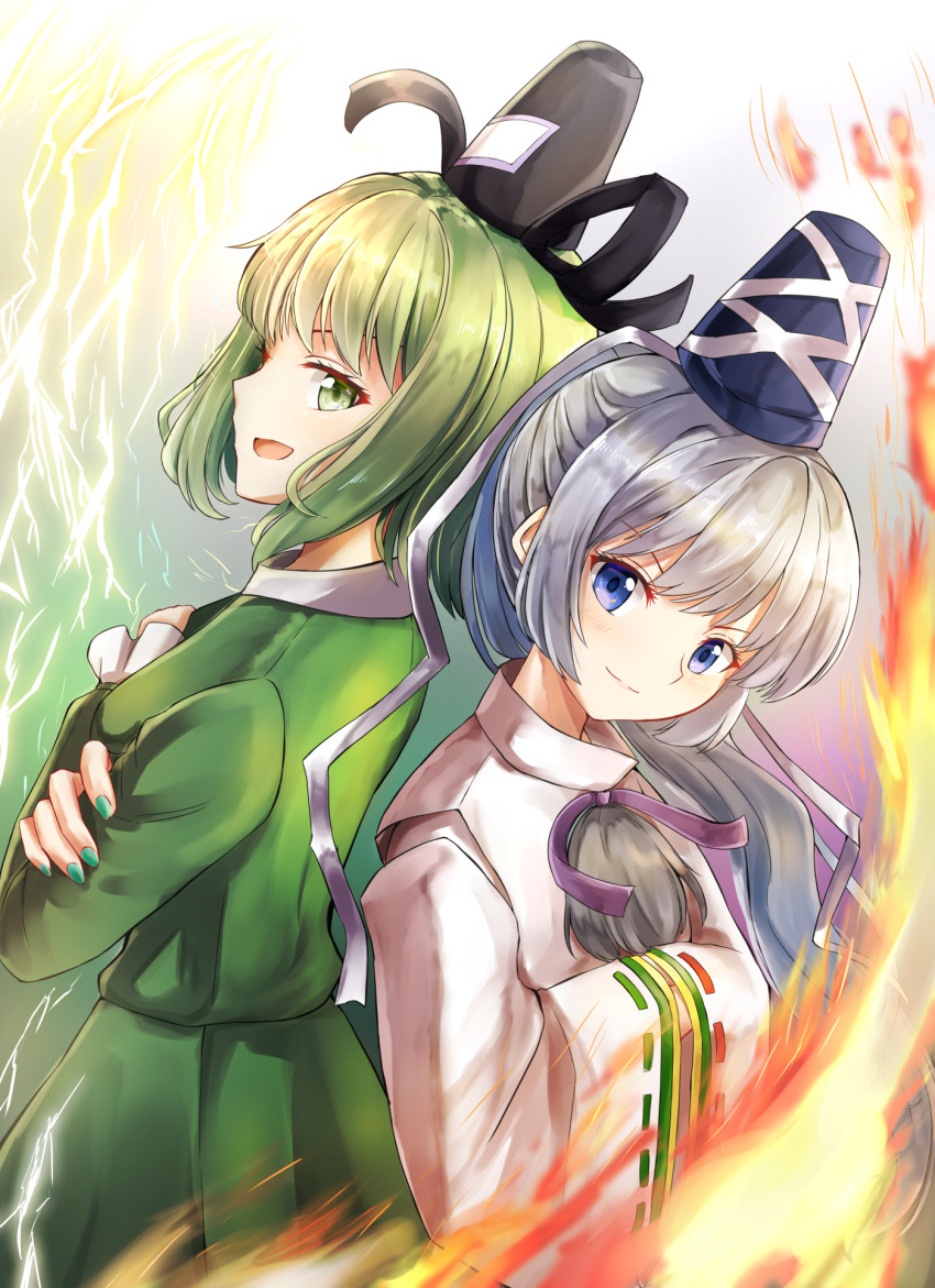 2girls back-to-back blue_eyes crossed_arms dress fire green_dress green_eyes green_hair green_nails grey_hair hands_in_opposite_sleeves hat highres japanese_clothes kachuten kariginu lightning mononobe_no_futo multiple_girls ponytail ribbon-trimmed_sleeves ribbon_trim smile soga_no_tojiko tate_eboshi touhou upper_body wide_sleeves