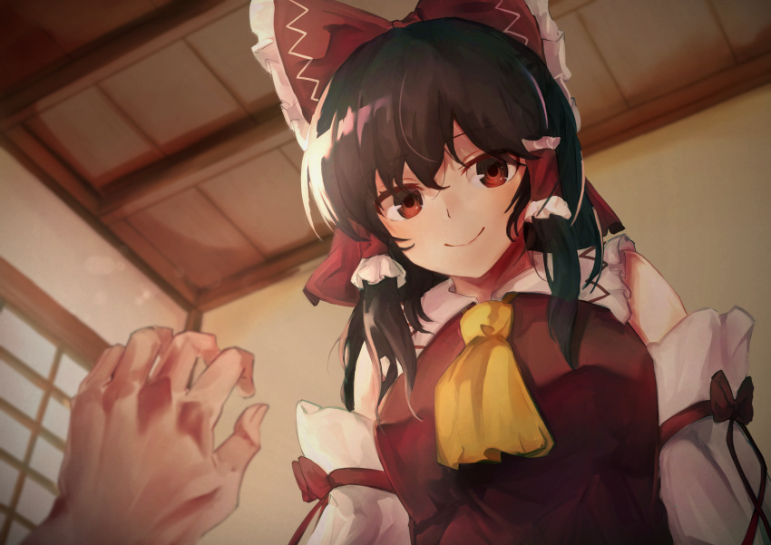 1girl 1other ascot bangs bare_shoulders bow breasts brown_hair closed_mouth commentary_request detached_sleeves eyebrows_visible_through_hair frilled_hair_tubes frilled_shirt_collar frills from_below hair_bow hair_tubes hakurei_reimu highres indoors long_hair looking_at_viewer medium_breasts pov pov_hands red_bow red_eyes red_vest smile taguno touhou upper_body vest window yellow_neckwear