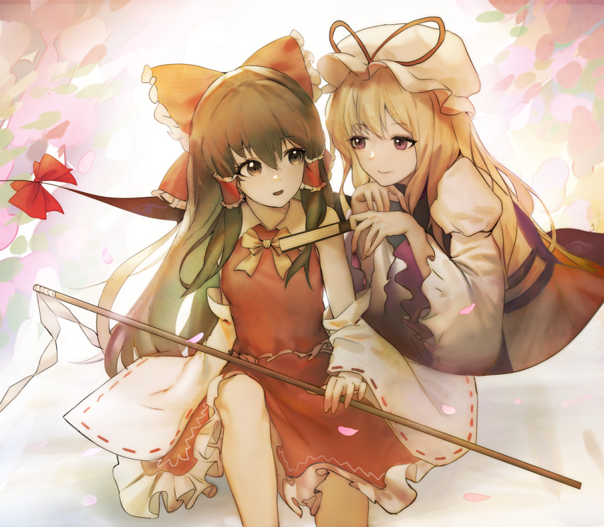 2girls blonde_hair closed_mouth gap_(touhou) gohei hakurei_reimu hat hat_ribbon holding holding_stick looking_at_another mob_cap multiple_girls red_ribbon ribbon siyumu smile stick touhou yakumo_yukari