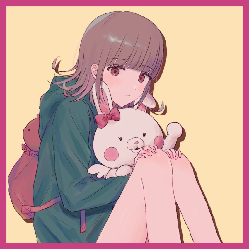 1girl animal_bag backpack bag bangs bare_legs beige_background blunt_bangs blush blush_stickers border bow brown_hair cat_bag closed_mouth dangan_ronpa_(series) dangan_ronpa_2:_goodbye_despair ear_bow eyebrows_visible_through_hair feet_out_of_frame flipped_hair frown green_jacket hair_ornament hairclip hand_up hands_on_own_knees highres hood hood_down hooded_jacket jacket jecheubo knees_up long_sleeves looking_at_viewer medium_hair nanami_chiaki pink_bag pink_border pink_bow pink_eyes protected_link shirt sitting skirt usami_(dangan_ronpa)