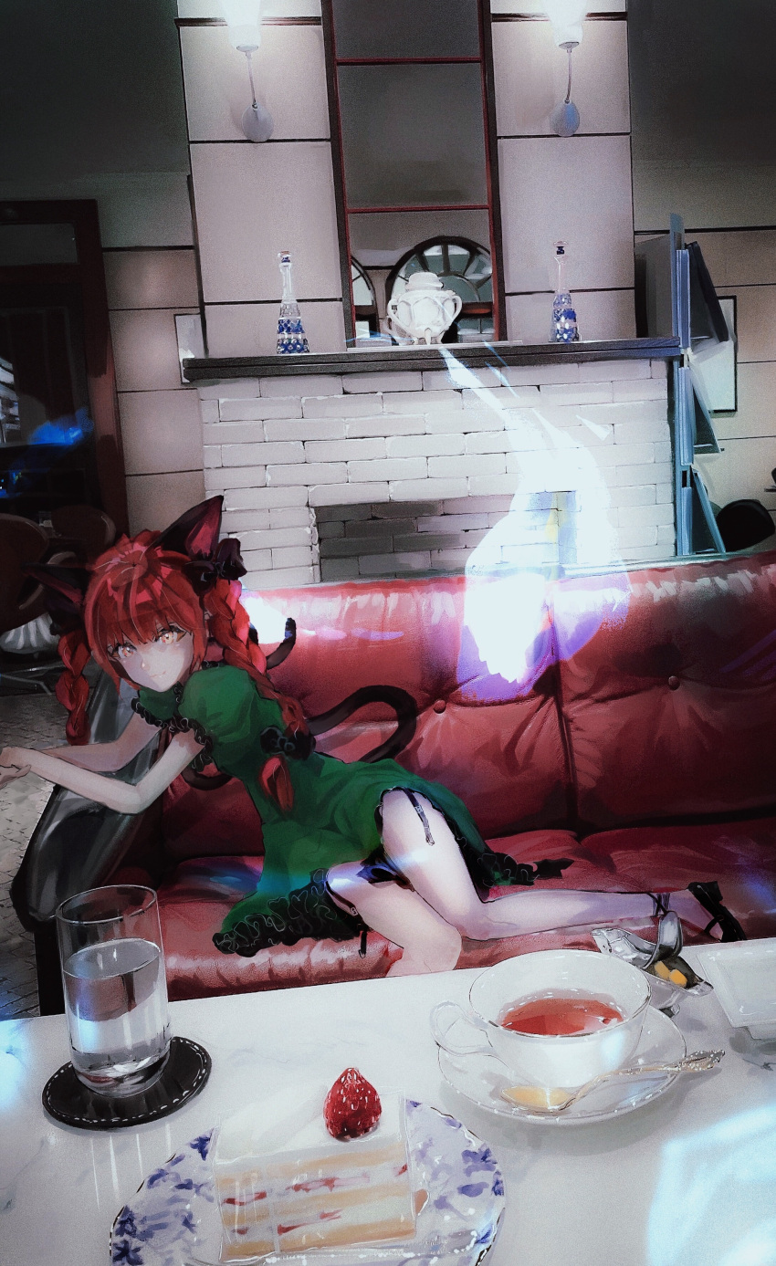 1girl absurdres animal_ears arm_rest bangs black_bow black_footwear blunt_bangs bow braid breasts cake case cat_ears cat_tail closed_mouth couch cup dress fireplace food fruit glass green_dress hair_bow highres hitodama indoors insomnia_(lnsomnia0510) kaenbyou_rin knees_together_feet_apart lamp light_smile long_hair looking_at_viewer mirror multiple_tails nekomata pink_eyes saucer sitting small_breasts solo spoon strawberry sunlight table tail tea teacup teapot touhou twin_braids twintails two_tails wall water