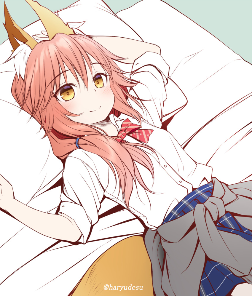 1girl animal_ear_fluff animal_ears arm_up bangs blue_skirt blush bow breasts brown_eyes closed_mouth clothes_around_waist collared_shirt commentary_request diagonal_stripes dress_shirt eyebrows_visible_through_hair fate/extra fate_(series) fox_ears fox_girl fox_tail hair_between_eyes hand_up haryuu_(poetto) highres looking_at_viewer lying on_back on_bed pillow pink_hair plaid plaid_skirt pleated_skirt red_bow shirt short_sleeves skirt small_breasts smile solo striped striped_bow tail tamamo_(fate)_(all) tamamo_no_mae_(fate) twitter_username white_shirt
