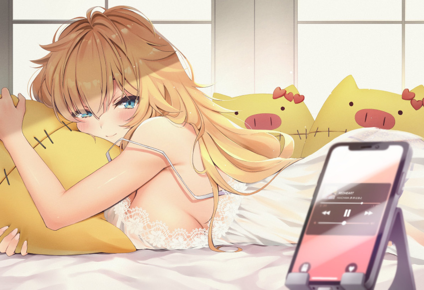 1girl akai_haato bangs blonde_hair blue_eyes blush breast_press breasts cellphone closed_mouth haaton_(akai_haato) hair_between_eyes highres hololive indoors large_breasts light_smile long_hair looking_at_viewer lying makinan nightgown on_stomach phone pillow pillow_hug shadow smartphone solo strap_slip stuffed_animal stuffed_pig stuffed_toy sunlight virtual_youtuber window