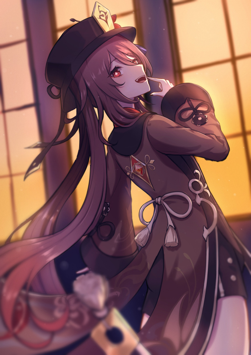 1girl absurdres black_headwear black_shorts brown_hair chinese_clothes fang from_behind genshin_impact half-closed_eyes hat highres hu_tao long_sleeves open_mouth red_eyes shorts smile sunset symbol-shaped_pupils tailcoat top_hat twintails upper_teeth wide_sleeves window yatumeshinoa