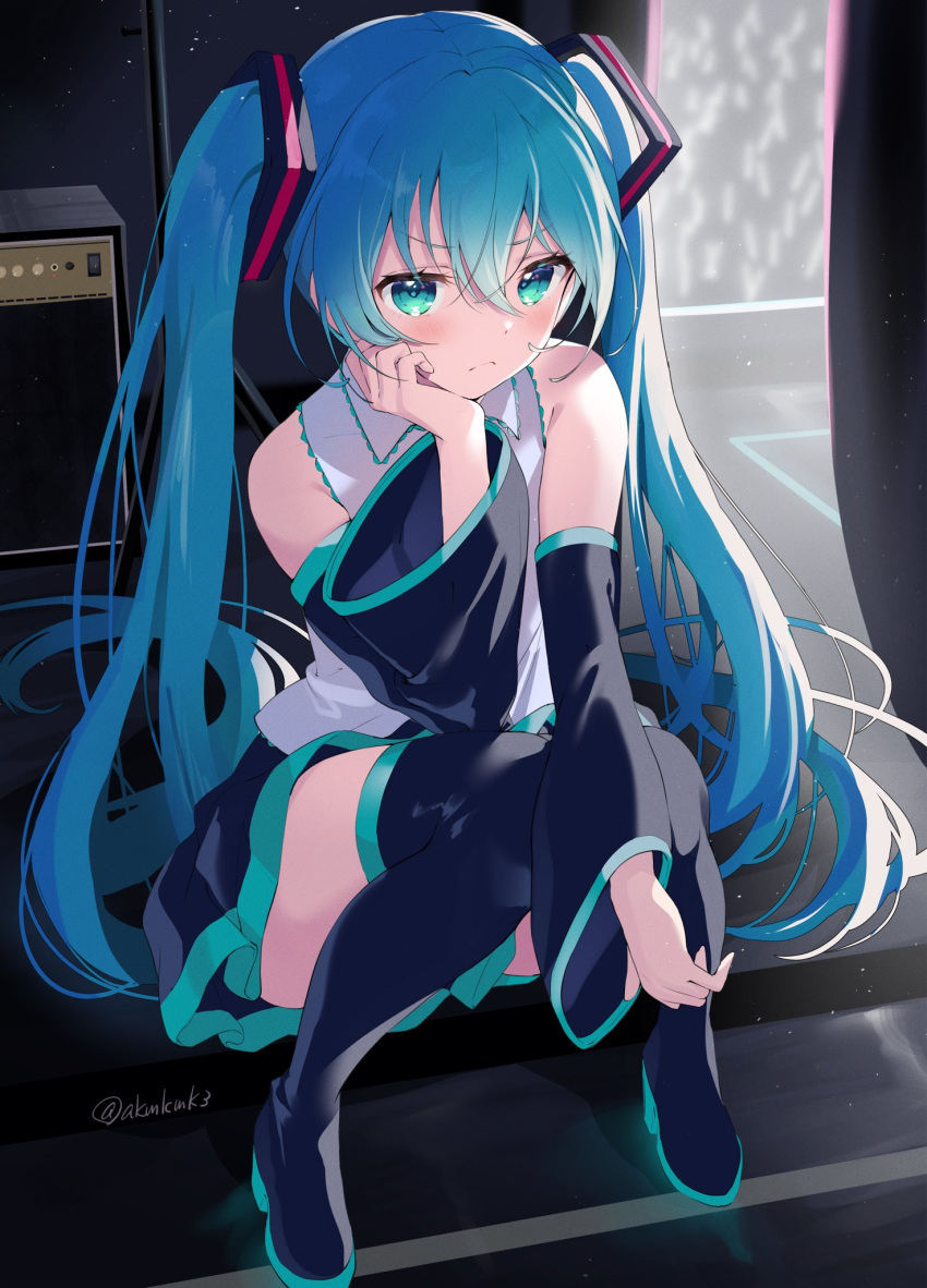 1girl amplifier_(instrument) aqua_eyes aqua_hair audience backstage bare_shoulders black_legwear black_skirt black_sleeves boots cheek_rest concert curcumin curtains detached_sleeves frilled_shirt frills frown full_body glowstick grey_shirt hair_ornament hand_on_own_cheek hand_on_own_face hatsune_miku highres long_hair looking_at_viewer miniskirt pleated_skirt pout shirt sitting skirt sleeveless sleeveless_shirt solo thigh-highs thigh_boots twintails twitter_username v-shaped_eyebrows very_long_hair vocaloid zettai_ryouiki