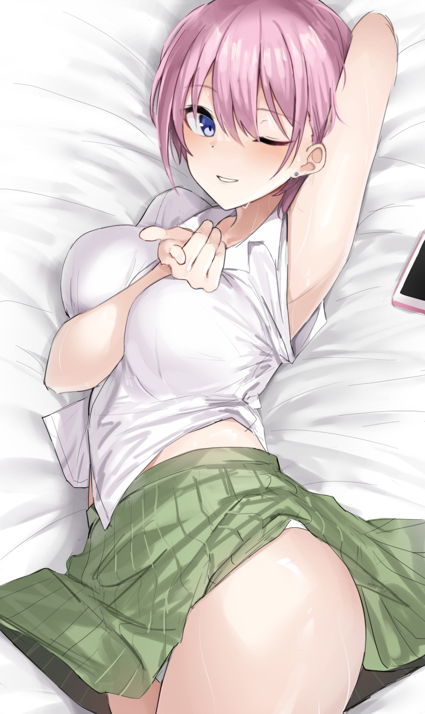 1girl ;) absurdres arm_behind_head arm_between_breasts arm_up armpits bangs bed_sheet between_breasts blue_eyes breasts cellphone collared_shirt eyebrows_visible_through_hair facing_viewer go-toubun_no_hanayome green_skirt hair_between_eyes highres large_breasts looking_at_viewer lying nakano_ichika on_back one_eye_closed phone piercing pink_hair pointing pointing_at_viewer shengtian shirt short_hair skirt smartphone smile solo sweat teeth thighs white_shirt